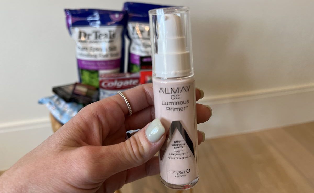hand holding a bottle of Almay Smart Shade CC Primer