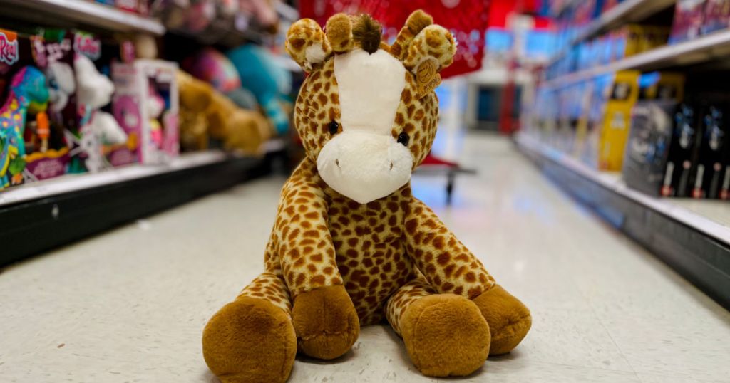 stuffed giraffe on floor 