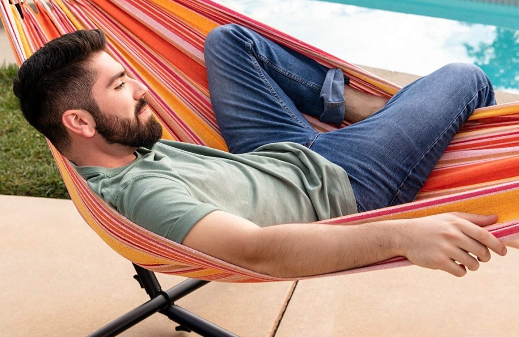 man laying on a hammock
