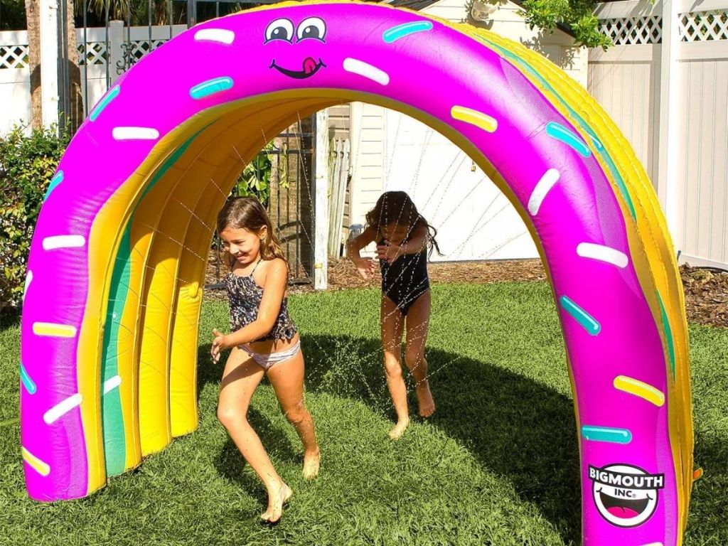 donut sprinkler with kids running through it