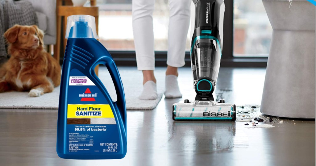 Bissell Hard Floor Sanitize Cleaner bottle on background of hard floor