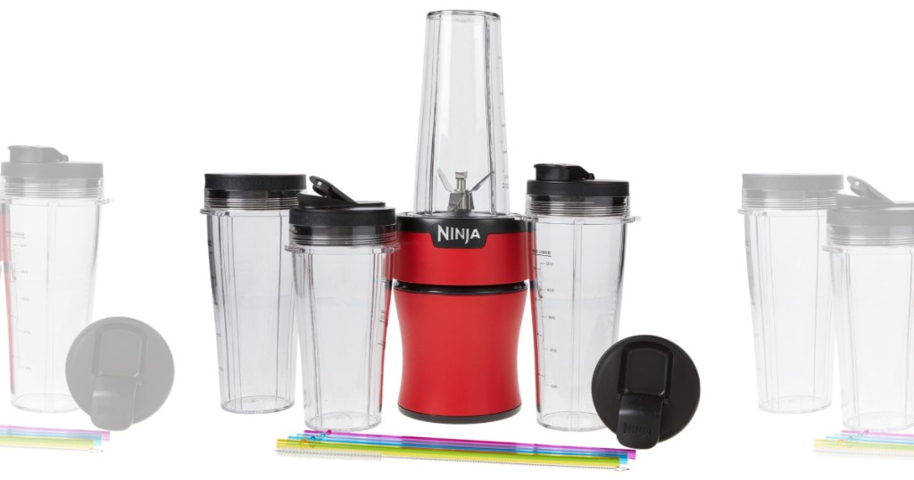 Red Ninja blender with 3 cups and straws