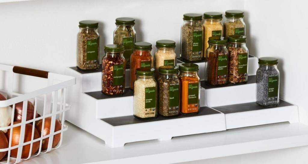 expandable spice shelf with spices on it