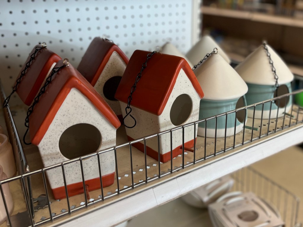 hanging birdhouses on store shelf