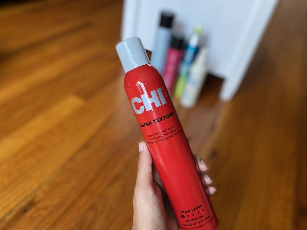hand holding Chi Infra Texture Spray