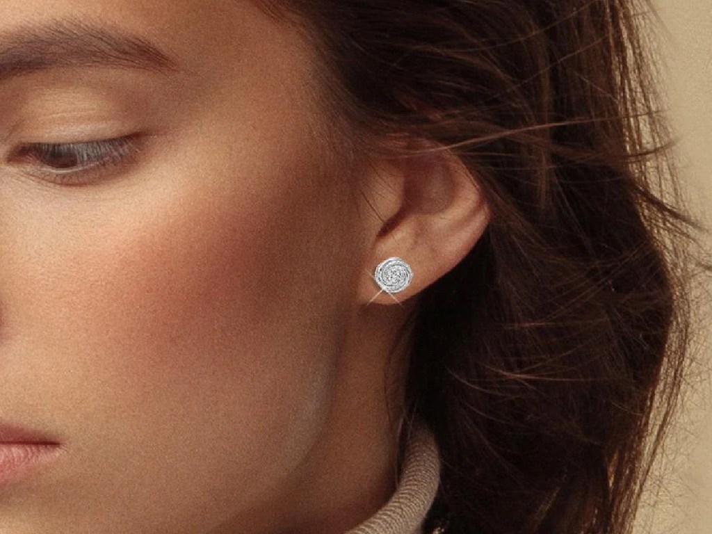 woman wearing diamond earring