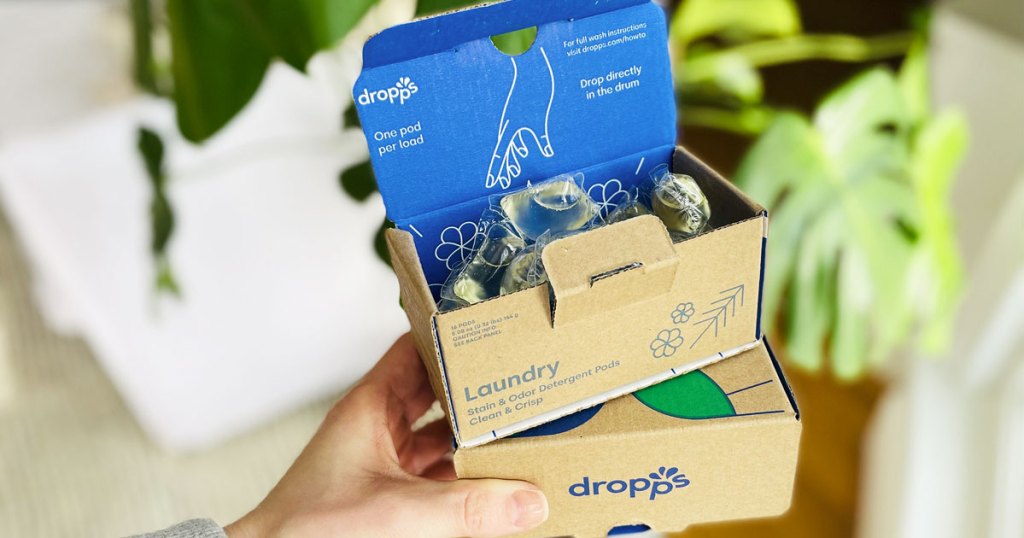 holding boxes of dropps detergents