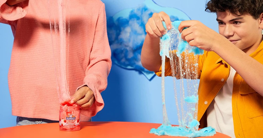 kids playing with gooey slime in pink and blue