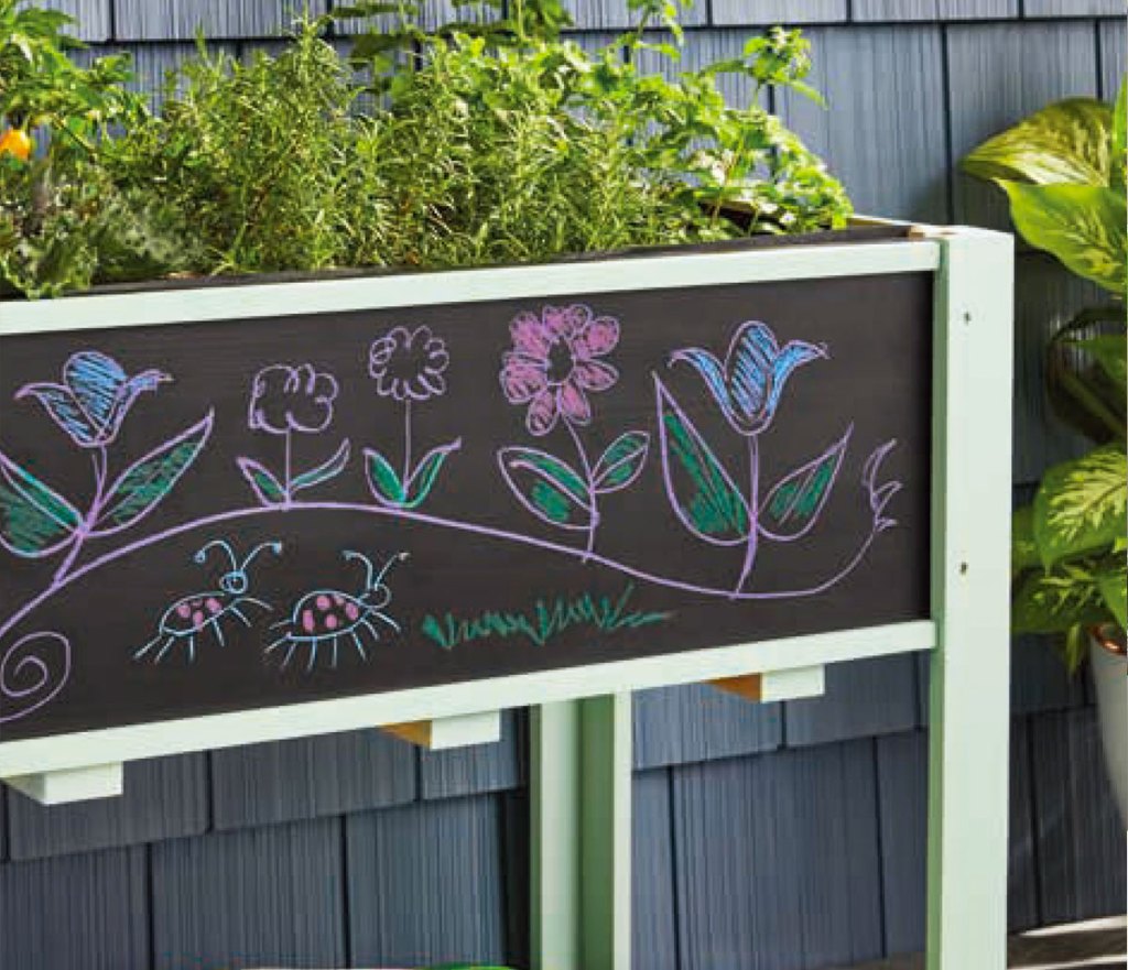 chalk board on raised garden bed