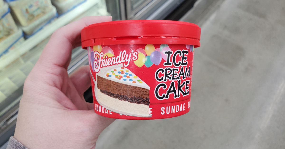 hand holding ice cream cake sundae single cup in store