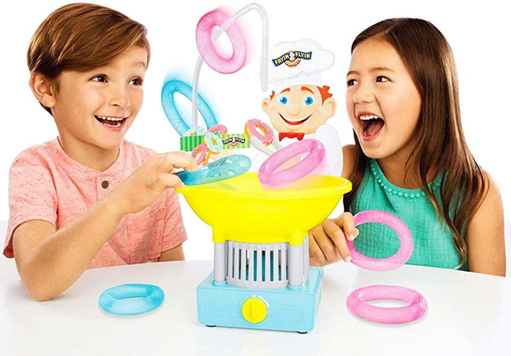 two kids playing Fryin' Flyin Donuts Game