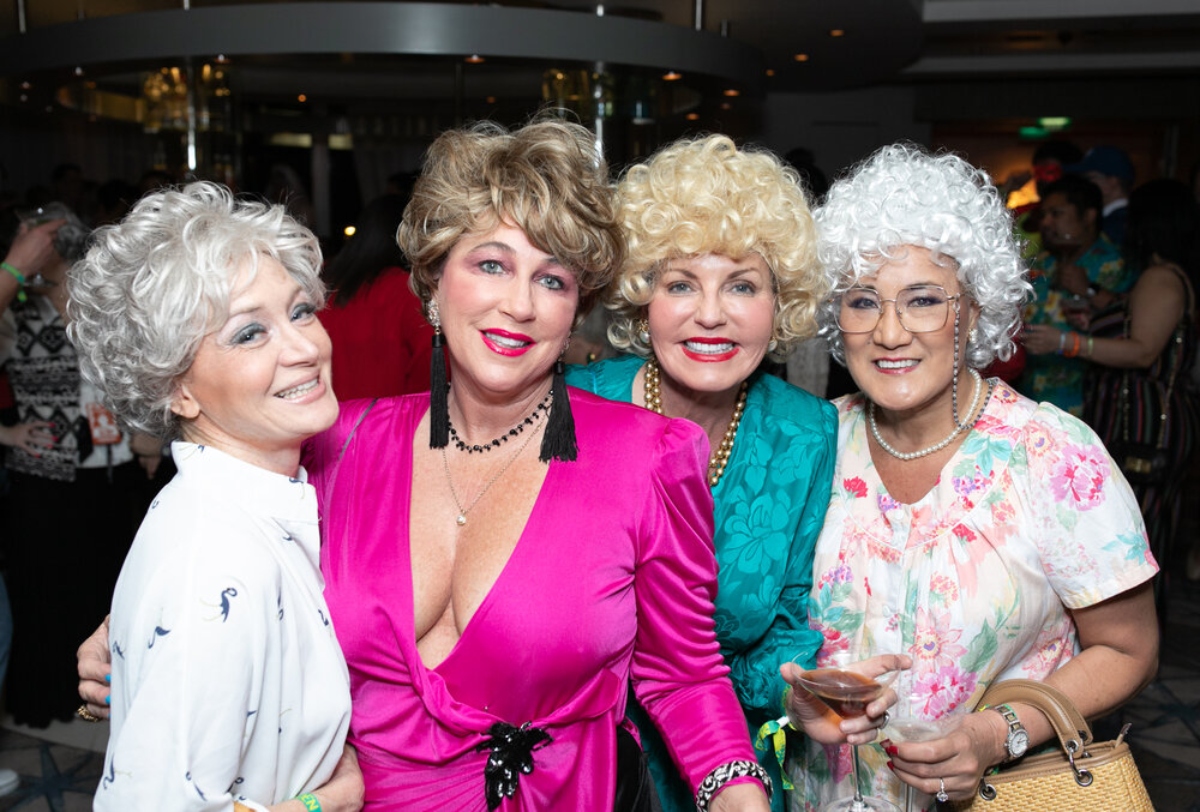 4 people dressed up like The Golden Girls