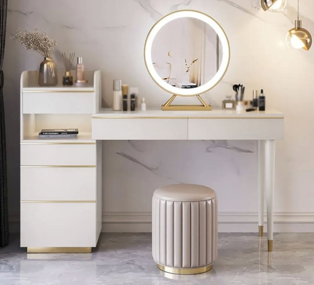white vanity with light and stool
