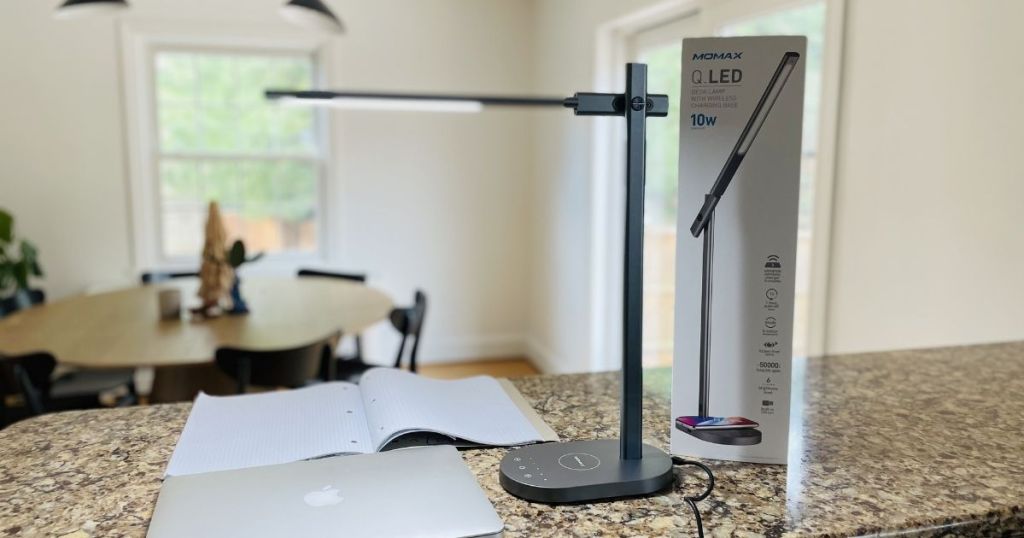 MOMAX Smart LED Desk Lamp w/ Wireless Charging Base on counter