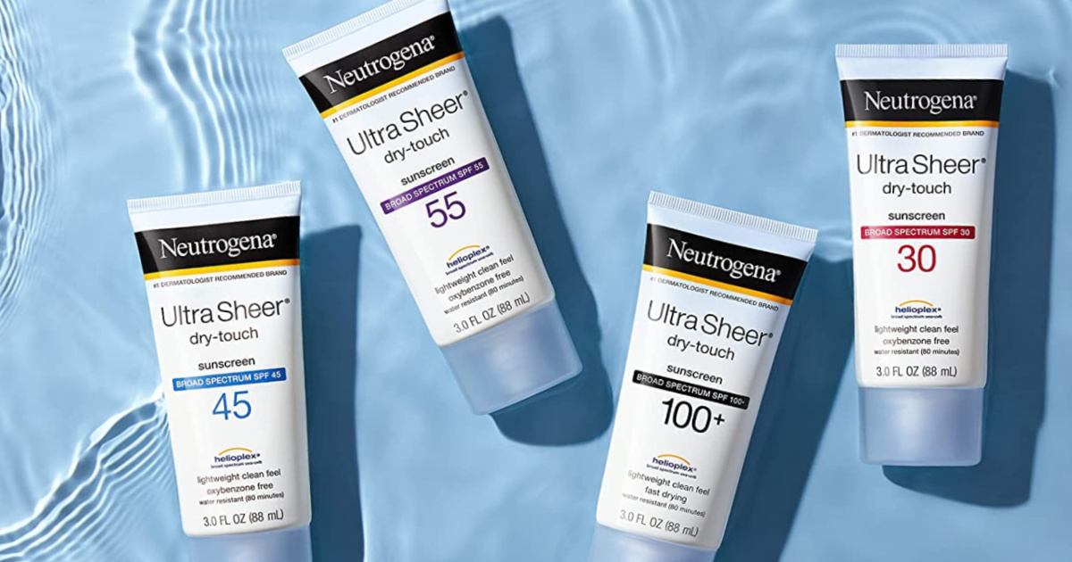 four tubes of sunscreen in water