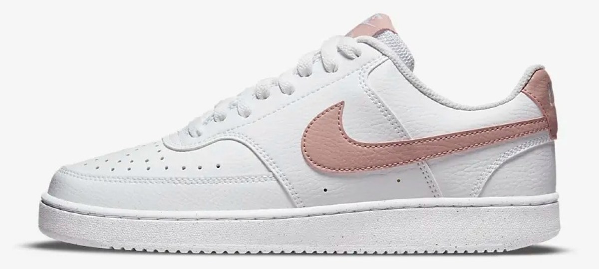 white and pink Nike shoe