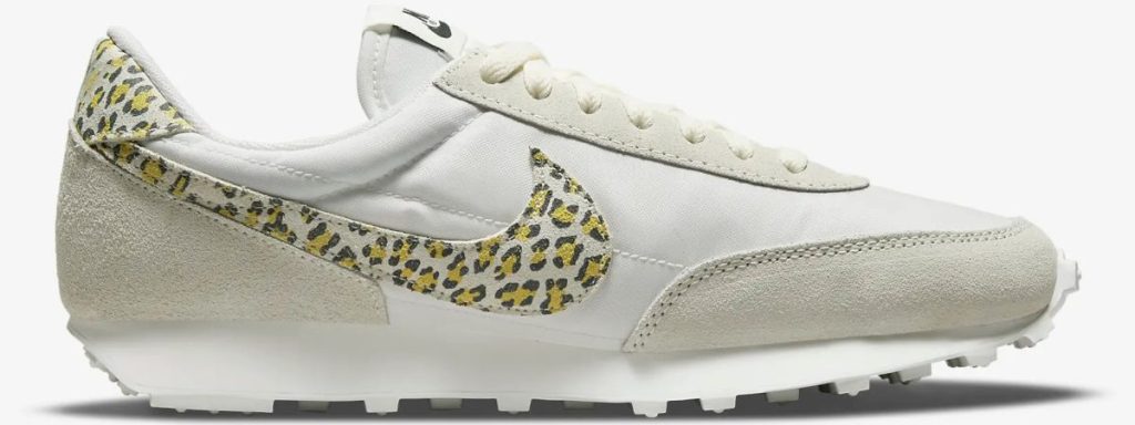 white women's sneaker with yellow cheetah print detail