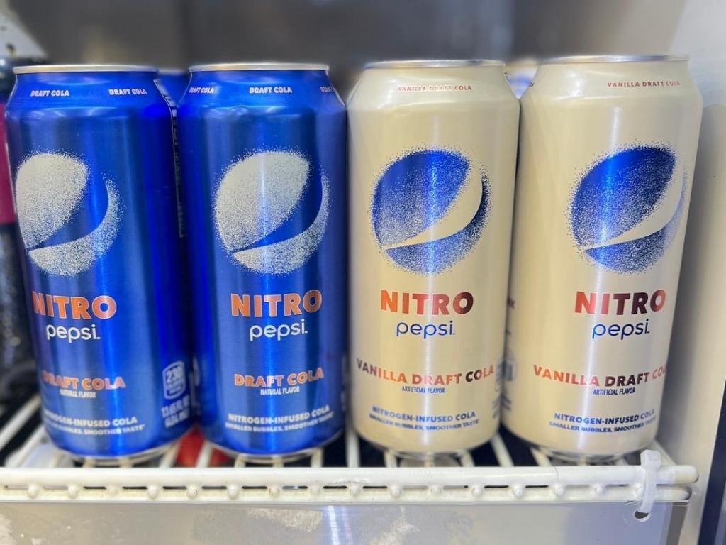 single cans of nitro pepsi in store refrigerator