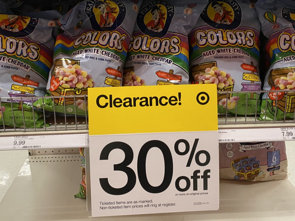 bags of colorful puffed popcorn on store shelf