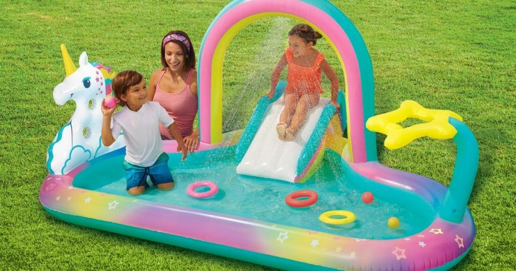 kids playing on Play Day Round Inflatable Rainbow Play Center