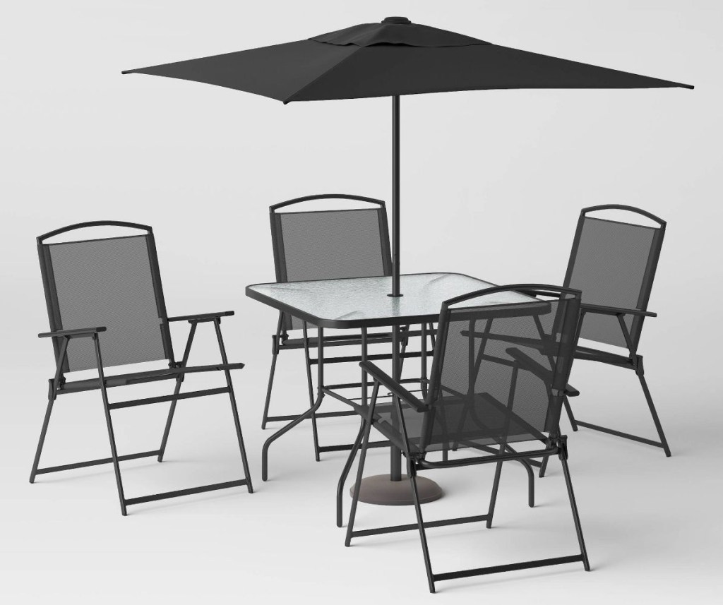 black patio dining set with matching umbrella