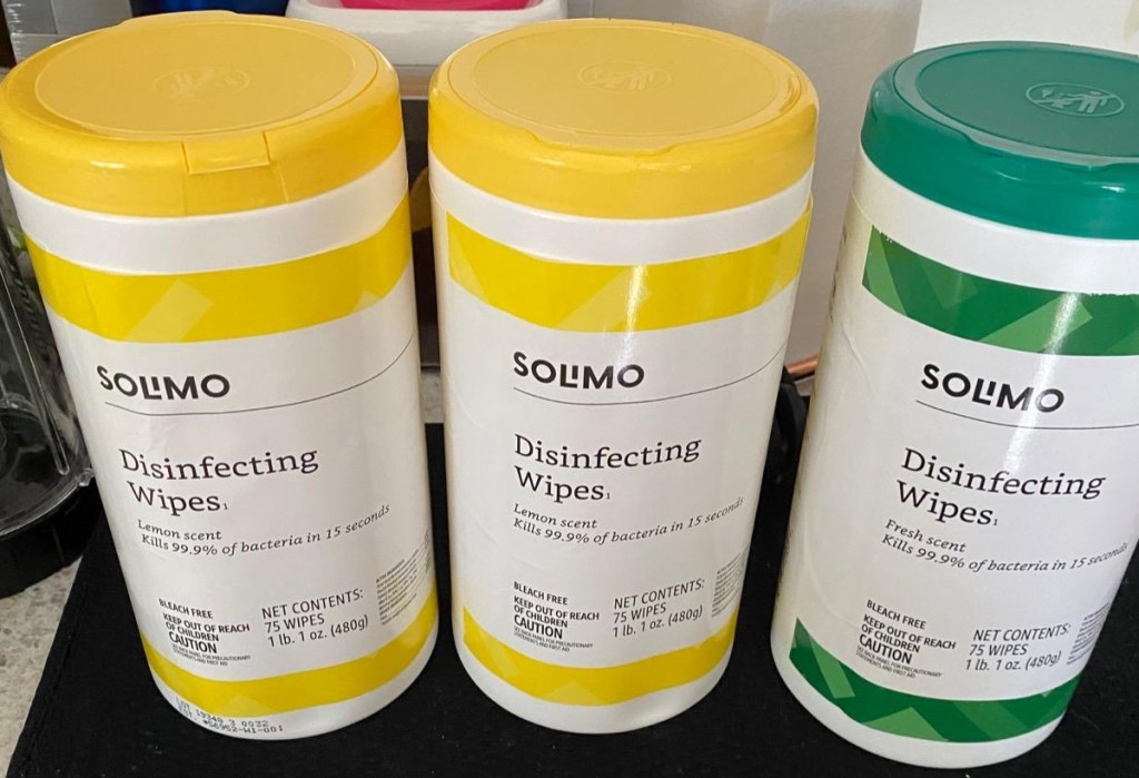 three containers of Solimo Wipes
