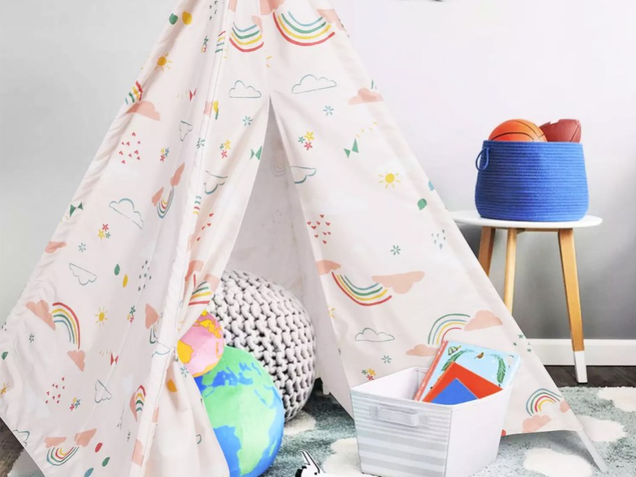 rainbow print kids tent in playroom