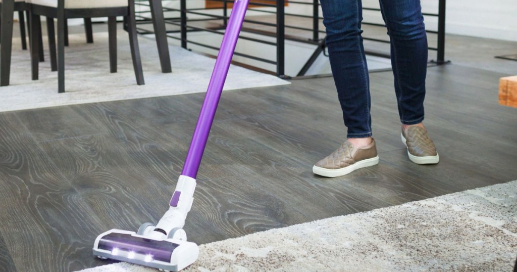 Tineco A10-D stick vacuum vacuuming up a rug