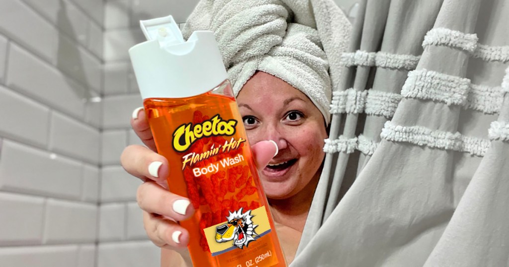Woman in Shower Holding Body Wash