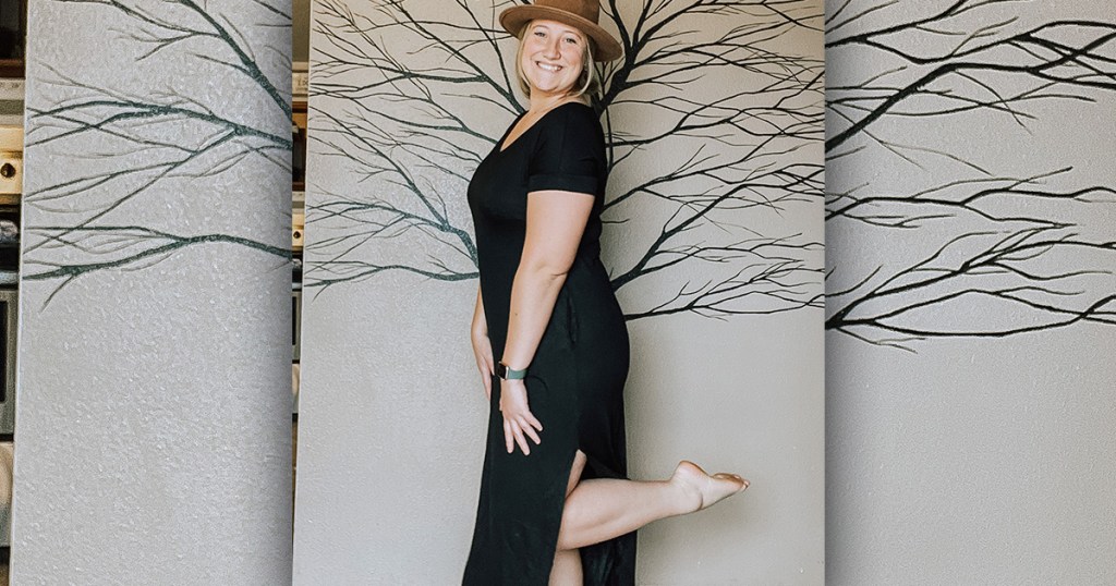 woman posing with amazon black maxi dress and wide brim hat