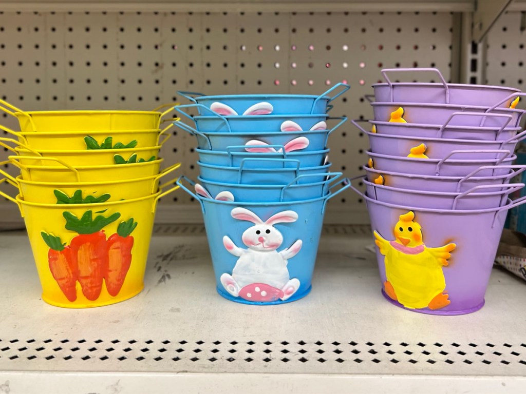 three easter buckets on shelf at dollar tree
