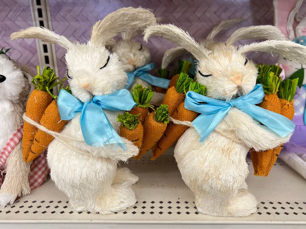 white easter bunnies with blue bow decor