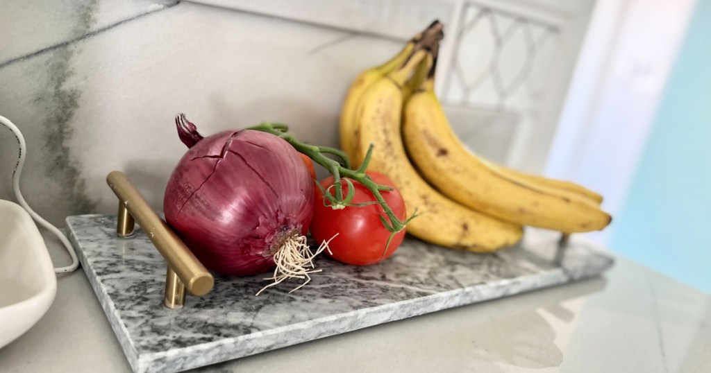 fruits and veggies on a counter as they do not need to be stored in the fridge
