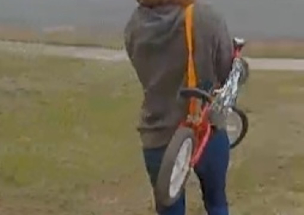 holding bike