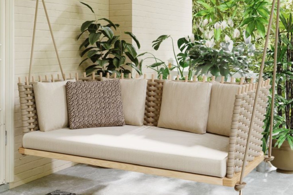 rattan swing with pillows