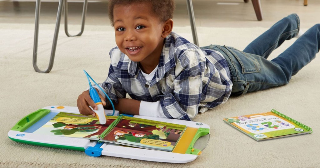 boy using leapfrog learning bundle