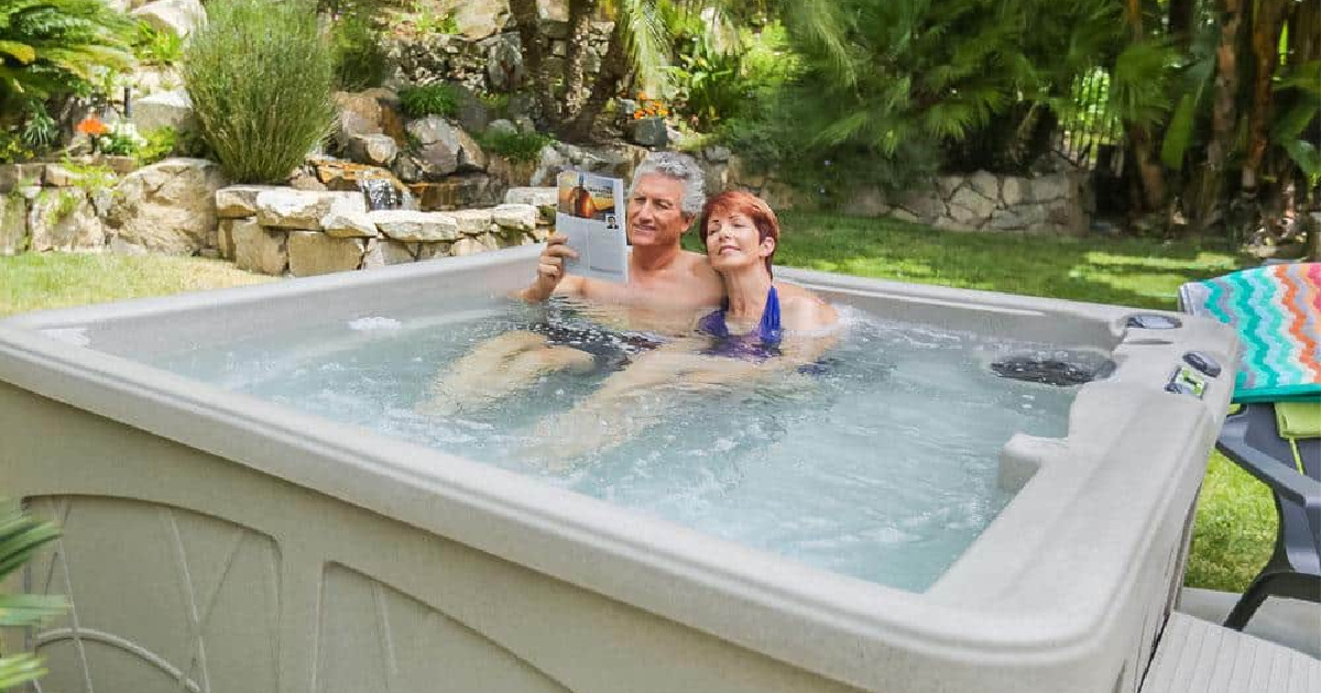 man and woman in a lifesmart hot tub