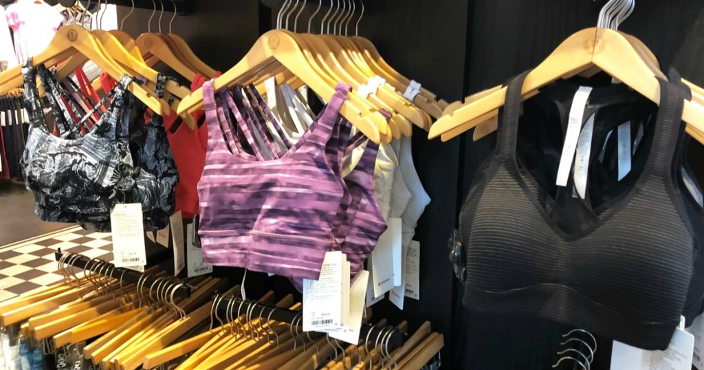 store display of lululmeon sports bras on hangers
