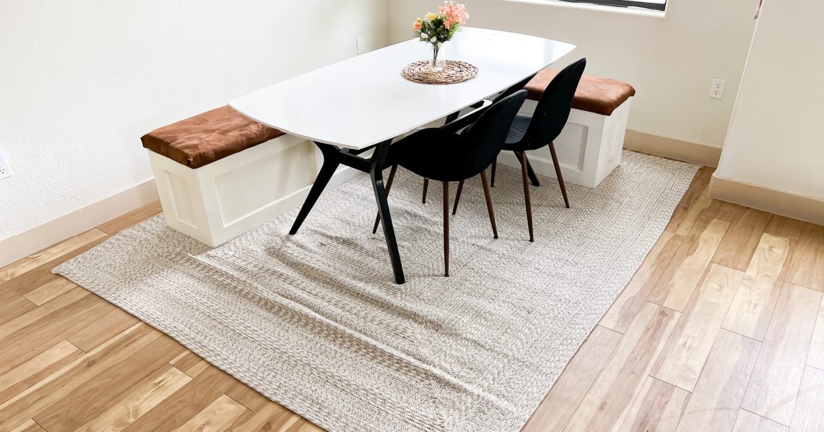 nuLoom brand braided rug on light hardwood floors