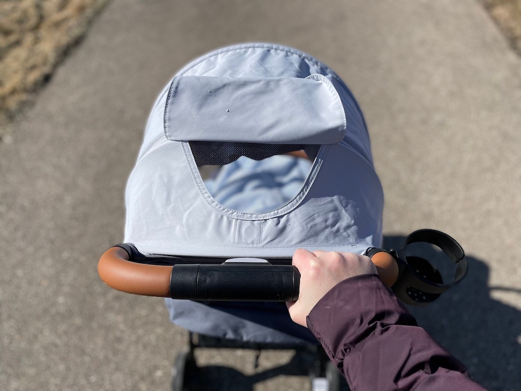 pushing baby stroller