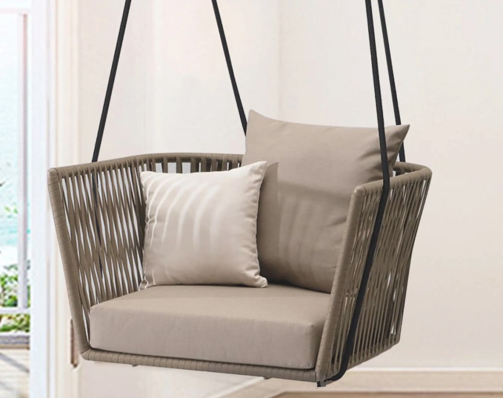 brown rattan swinging chair