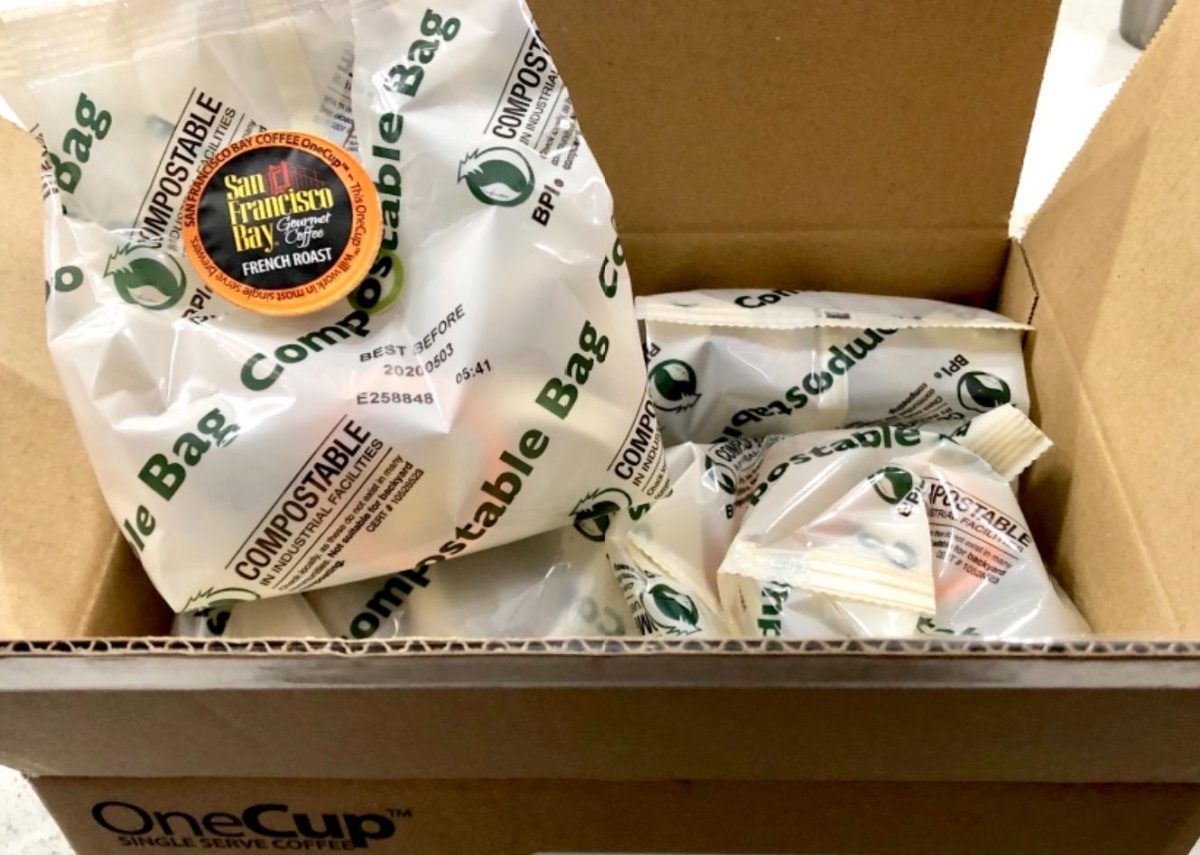 open box displaying bags of coffee pods