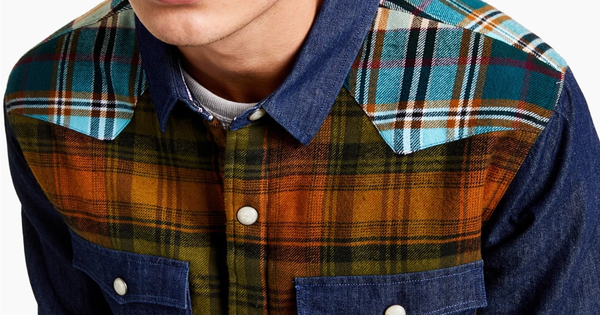 shoulder portion of a men's shirt jacket made in different patchwork of patterns