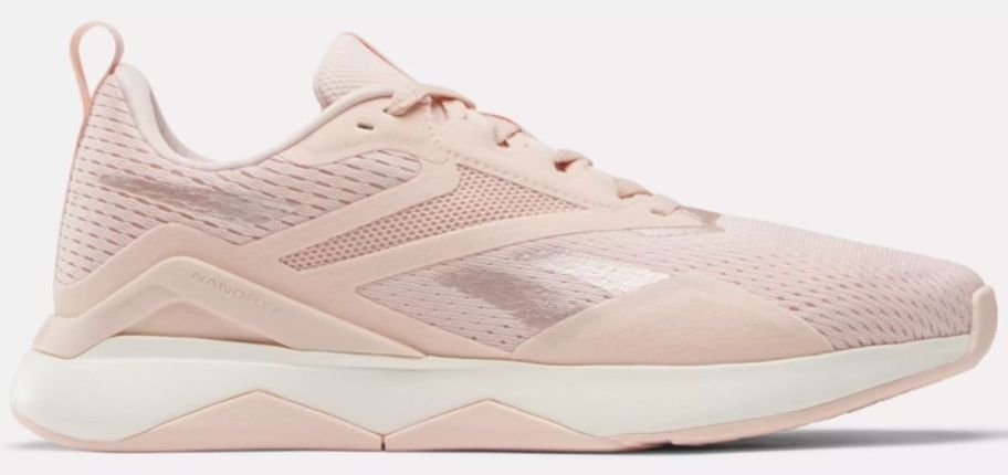 a light pink running shoe with pink foil accents