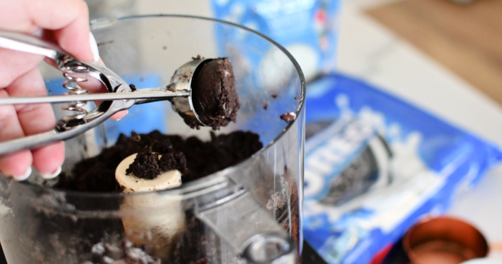using a cookie scoop to make oreo balls