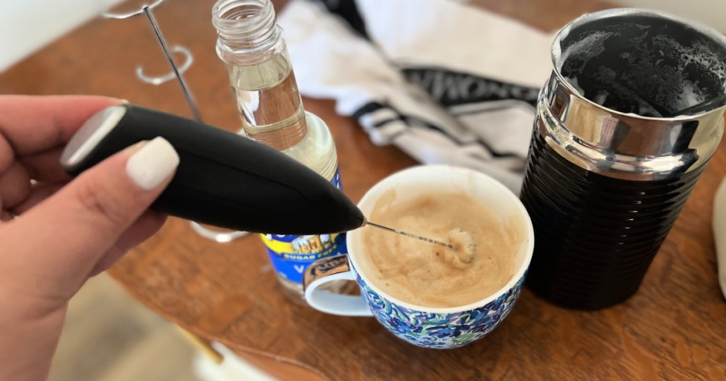 using a handheld coffee whisk