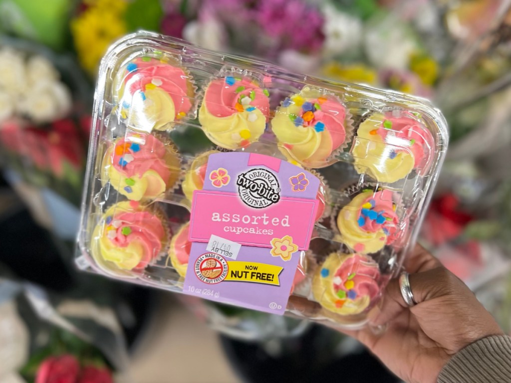 yellow and pink frosted cupcakes cookies in store