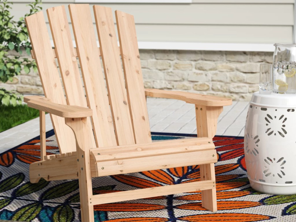 wood Adirondack chair on patio