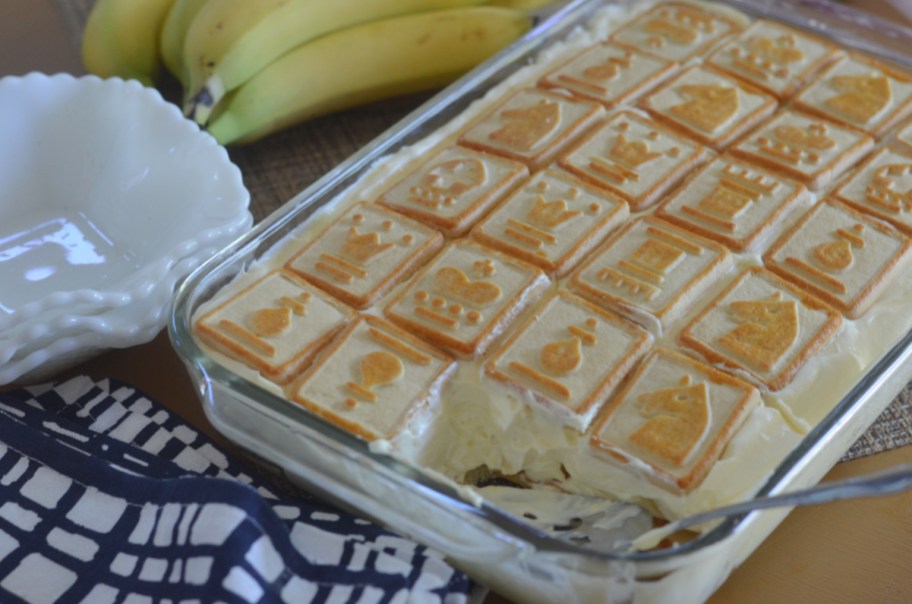 A pan of banana pudding with chessmen cookies inspired by paul deen banana pudding