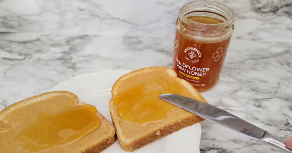 Beekeeper's Naturals Wildflower Honey on bread